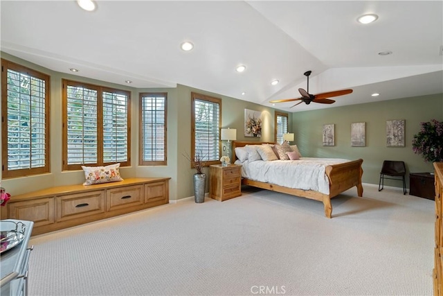 carpeted bedroom with lofted ceiling and ceiling fan