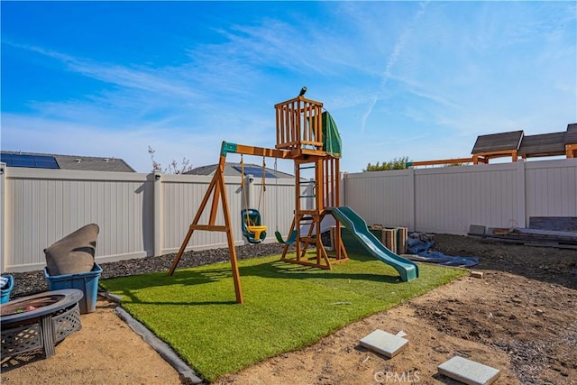 view of play area with a yard