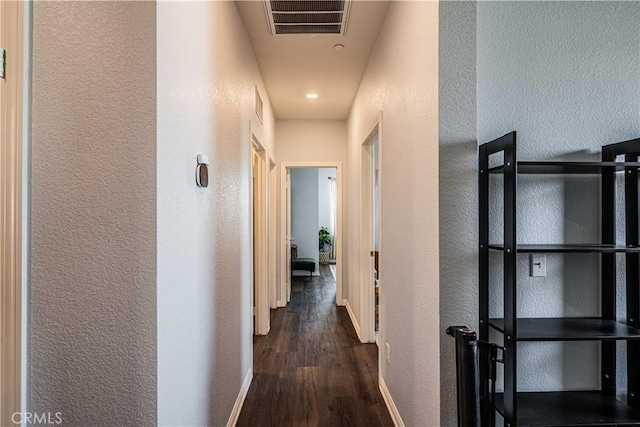 hall featuring dark hardwood / wood-style floors