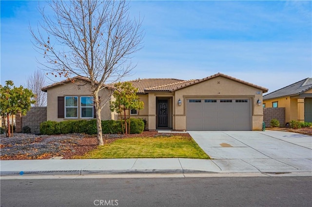 view of front of house featuring a garage, driveway, a tile roof, fence, and stucco siding