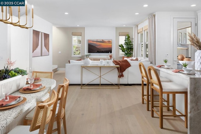 living room with light hardwood / wood-style flooring