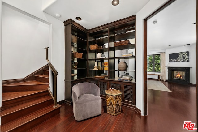 sitting room featuring wood-type flooring