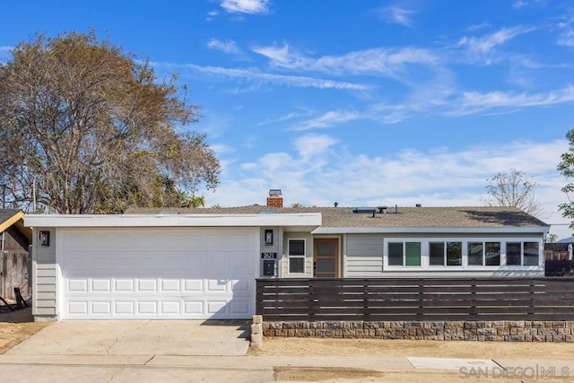 ranch-style home with a garage