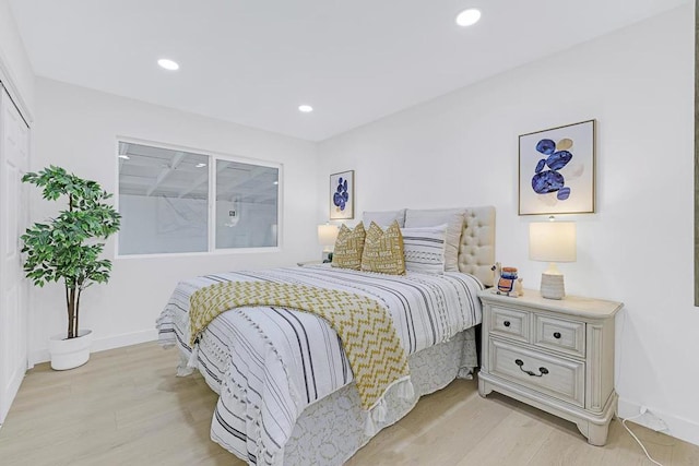 bedroom featuring light wood-type flooring