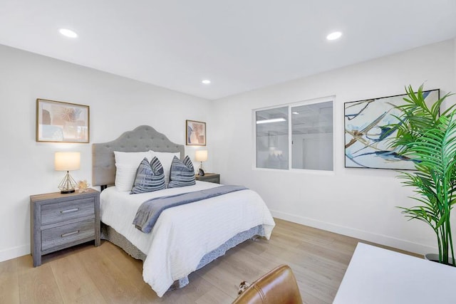 bedroom featuring light wood-type flooring