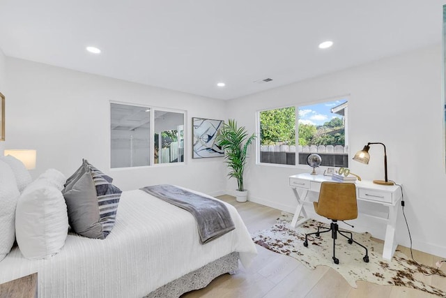 bedroom featuring light hardwood / wood-style flooring