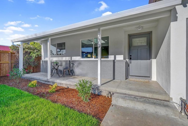 property entrance with covered porch