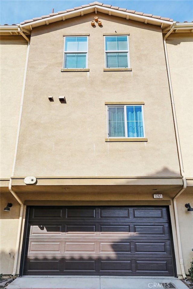 exterior space featuring a garage