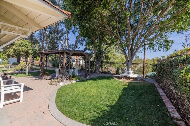 view of yard featuring a patio and a pergola