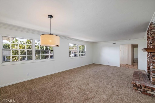 unfurnished living room with crown molding, light carpet, and a fireplace