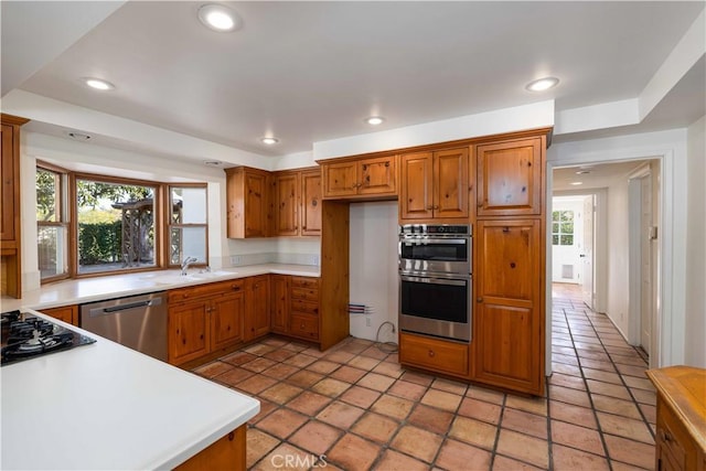 kitchen featuring sink, plenty of natural light, and appliances with stainless steel finishes