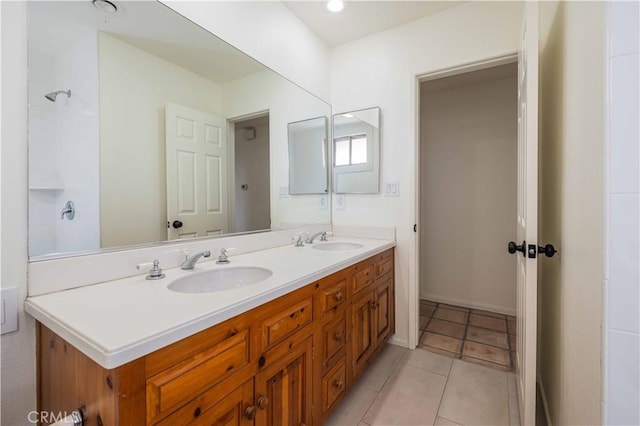 bathroom featuring vanity and tile patterned flooring