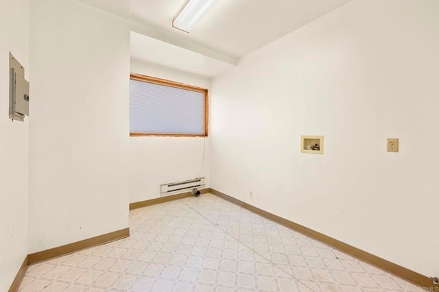 laundry room featuring hookup for a washing machine, a baseboard radiator, and electric panel