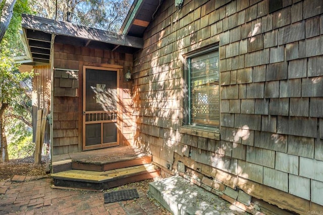 doorway to property featuring a patio