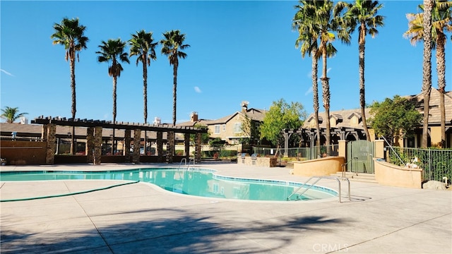 view of swimming pool with a patio