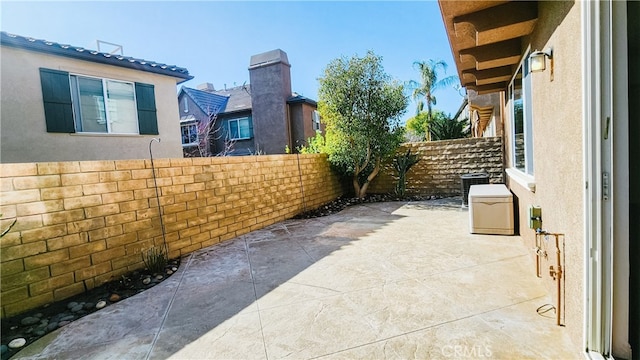 view of patio with central AC