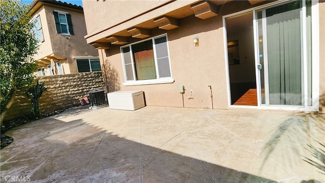 view of patio featuring cooling unit