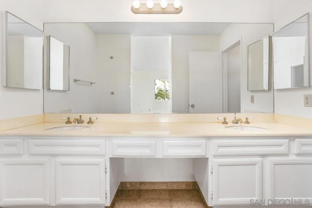 bathroom featuring vanity and tile patterned floors