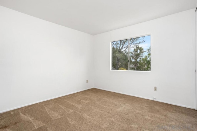 view of carpeted spare room