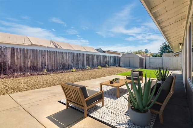 view of patio / terrace with a storage unit and outdoor lounge area