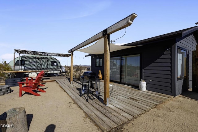 deck featuring a pergola