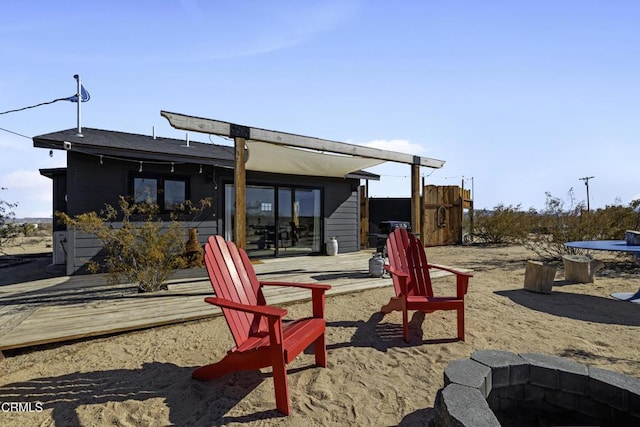 view of patio / terrace featuring an outdoor fire pit