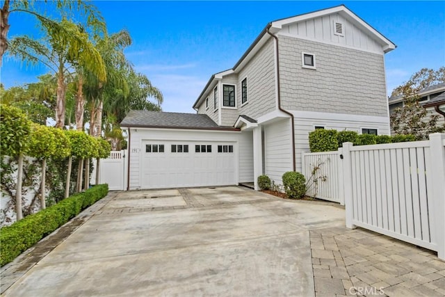 view of side of property featuring a garage