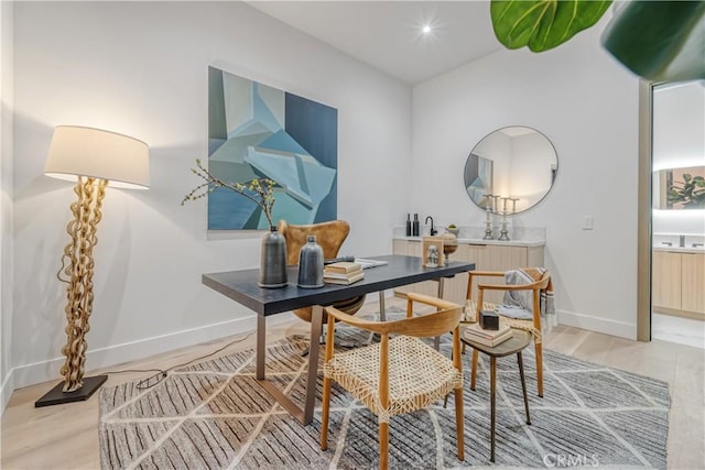 home office featuring light wood-type flooring