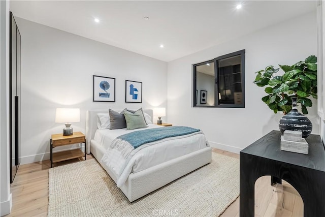 bedroom featuring light wood-type flooring