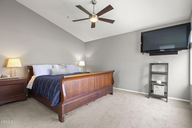 bedroom featuring lofted ceiling, light carpet, and ceiling fan