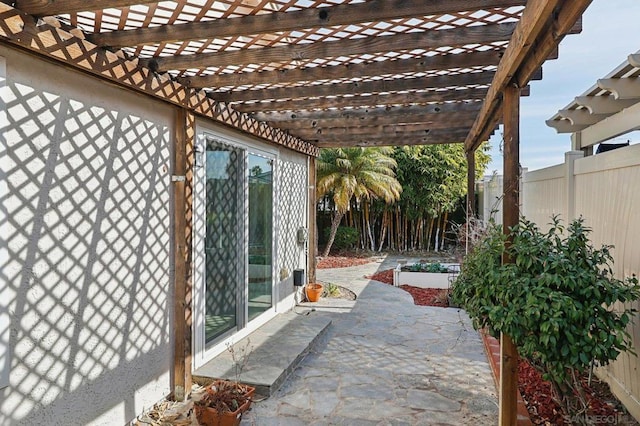 view of patio featuring a pergola