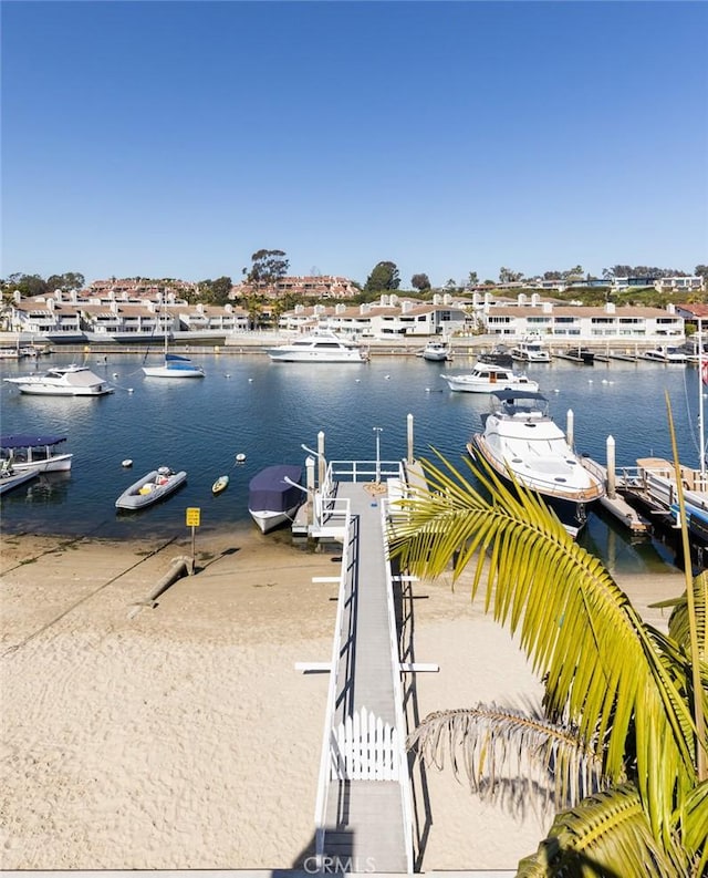 dock area featuring a water view