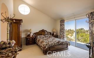 bedroom with lofted ceiling, access to outside, and light carpet