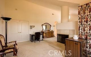 living area featuring light colored carpet