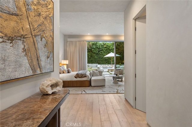 4727 Alonzo Ave, Encino, CA 91316 - bedroom featuring access to exterior and light hardwood / wood-style floors