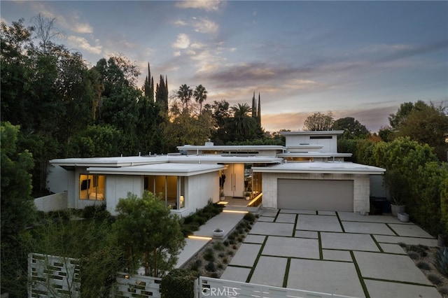 modern home featuring a garage