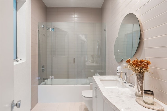 4727 Alonzo Ave, Encino, CA 91316 - full bathroom featuring vanity, combined bath / shower with glass door, and toilet