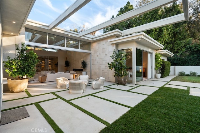 4727 Alonzo Ave, Encino, CA 91316 - back of house with an outdoor living space and a patio area