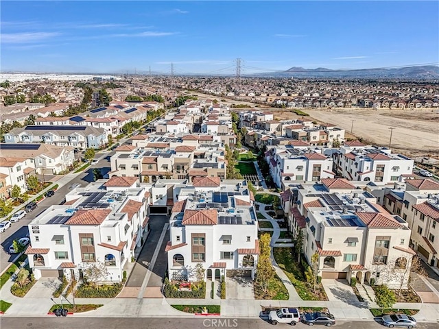 birds eye view of property featuring a mountain view