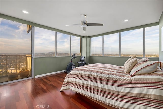 bedroom with recessed lighting, ceiling fan, baseboards, and wood finished floors