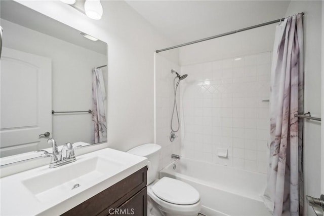 full bathroom featuring vanity, toilet, and shower / tub combo