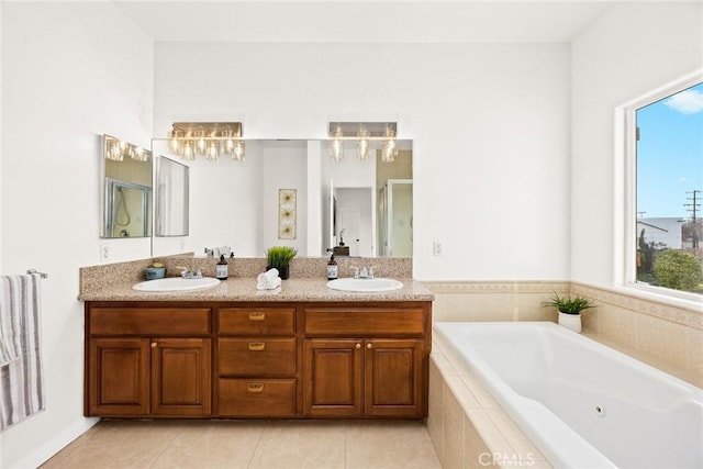 bathroom featuring vanity, shower with separate bathtub, and tile patterned flooring