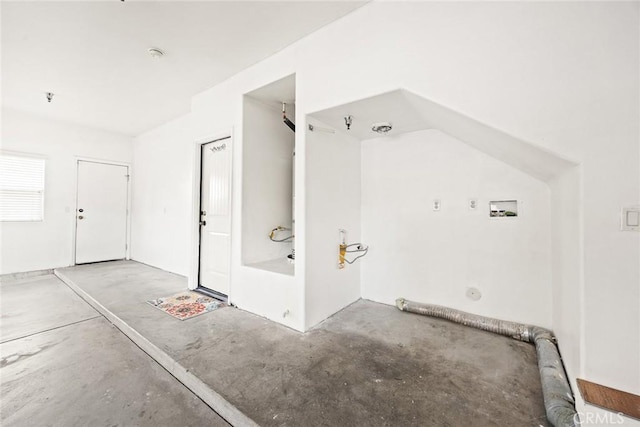 bathroom featuring concrete flooring