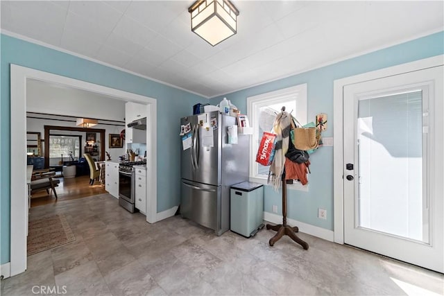 interior space featuring ornamental molding and appliances with stainless steel finishes