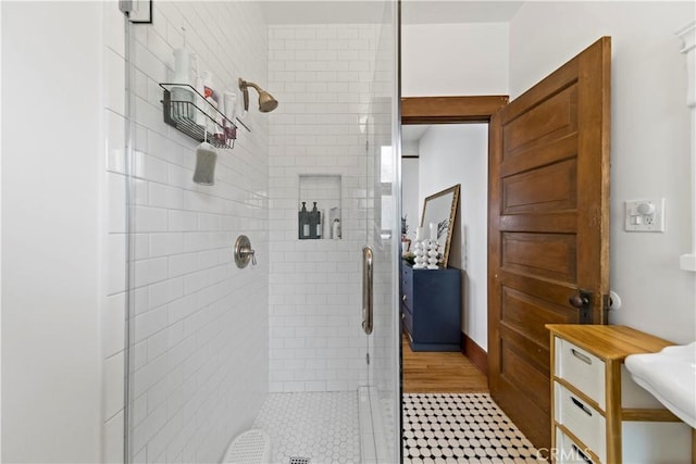 bathroom with an enclosed shower