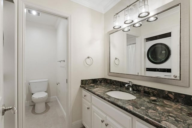 bathroom featuring vanity, crown molding, tile patterned floors, and toilet