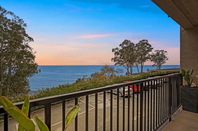 balcony at dusk with a water view