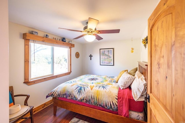 bedroom featuring hardwood / wood-style floors and ceiling fan