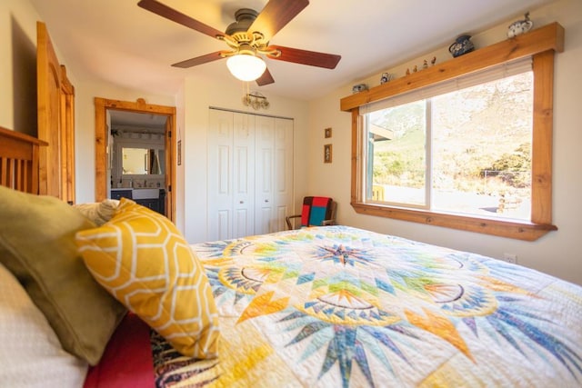 bedroom featuring ceiling fan and a closet