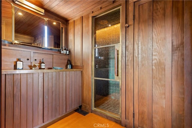 bar with wood ceiling and wood walls